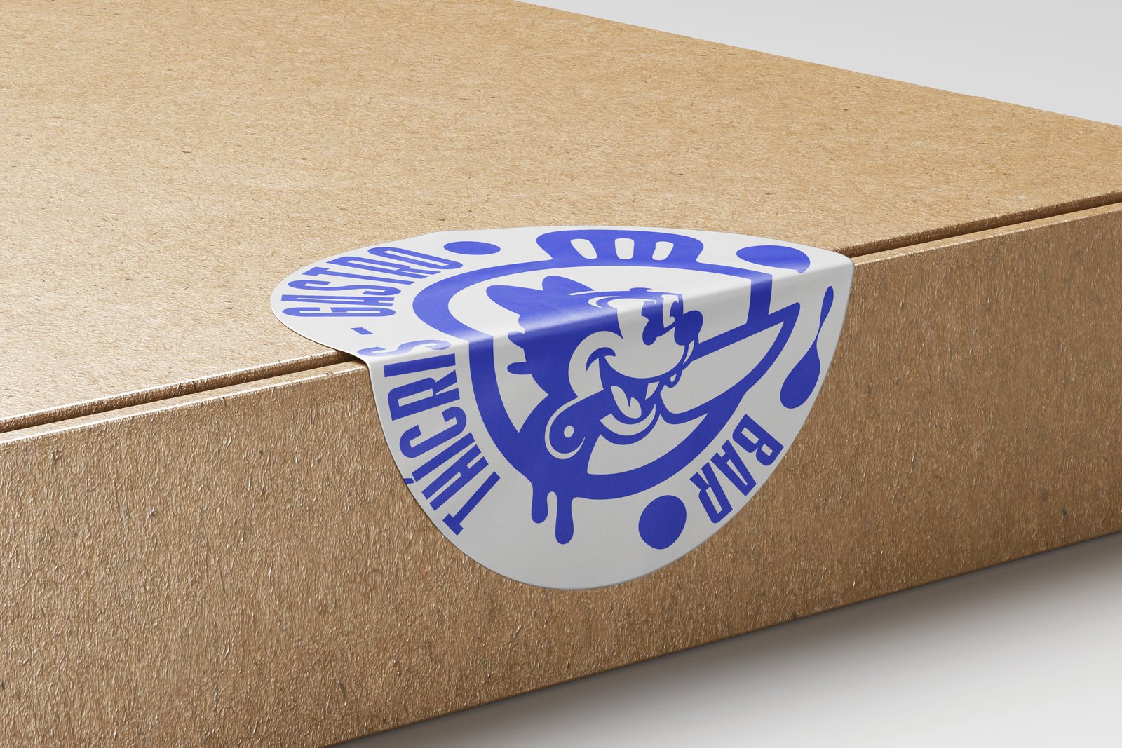 Pegatina troquelada Thícrys sobre una caja